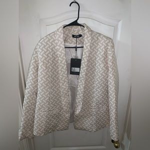 Two piece set. Blazer and suit shorts. Never worn.